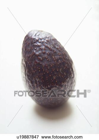 Stock Photo - Avocado, white background. Fotosearch