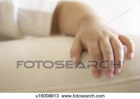 Baby's arm, close up View Large Photo Image Stock Image - Baby's arm, close up. Fotosearch