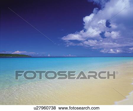 Stock Photo - Beach and sky, Okinawa Prefecture, Japan. Fotosearch