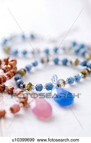 Stock Photo - Beaded necklace and pendant. Fotosearch