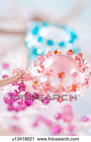 Stock Image - Beaded pendants of crystal beads and seed beads. Fotosearch