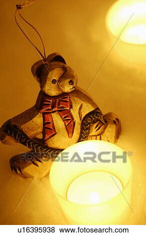 Bear decoration and candles View Large Photo Image Stock Photo - Bear decoration and candles. Fotosearch