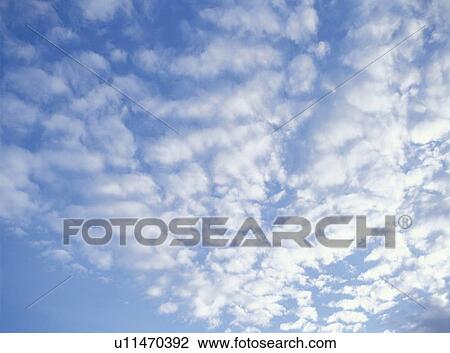 Stock Image - Blue sky and clouds. Fotosearch