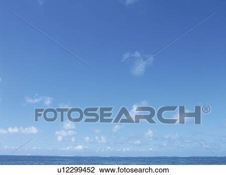 Blue sky, clouds and ocean View Large Photo Image Stock Image - Blue sky, clouds and ocean. Fotosearch