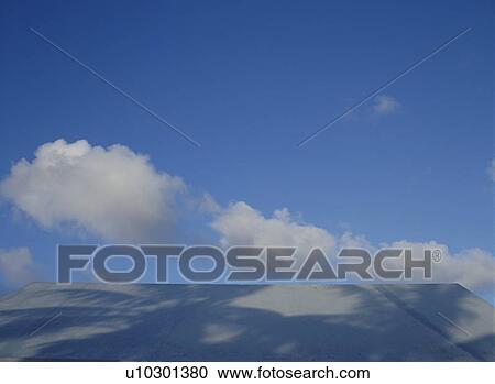 Blue sky over roof View Large Photo Image Stock Image - Blue sky over roof. Fotosearch