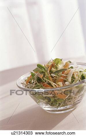 Bowl of salad on table View Large Photo Image Stock Image - Bowl of salad on table. Fotosearch