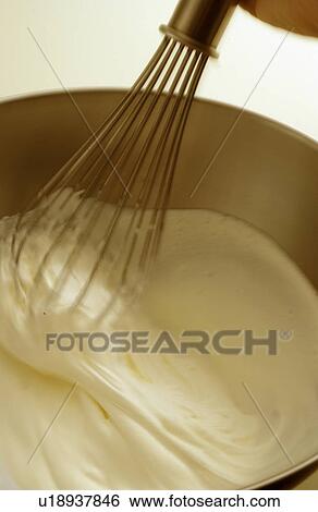 Stock Photograph - Bowl of whipped cream, close up. Fotosearch
