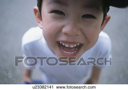 Stock Image - Boy smiling. Fotosearch