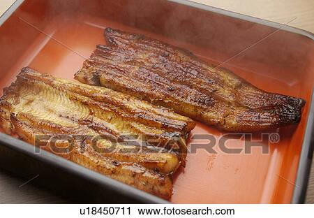 Broiled eel in box, close up View Large Photo Image Stock Image - Broiled eel in box, close up. Fotosearch