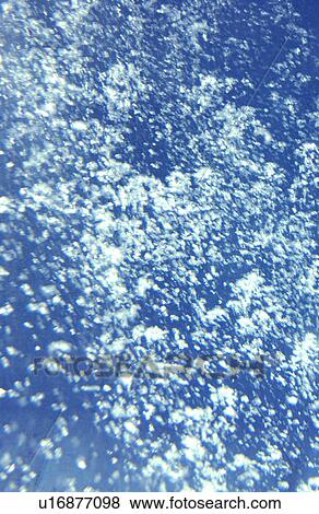 Bubbles in the sea, full frame View Large Photo Image Stock Photo - Bubbles in the sea, full frame. Fotosearch