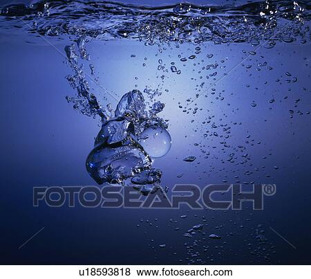 Stock Photo - Bubbles in water, blue background. Fotosearch