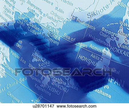 Businessman pushing button of mobile phone with image of globe, computer graphic, blurred motion, toned image View Large Photo Image Stock Photo - Businessman pushing button of mobile phone with image of globe, computer graphic, blurred motion, toned image. Fotosearch