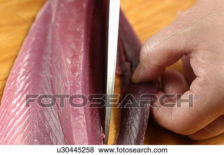 Chef cutting bonito, close up View Large Photo Image Stock Photo - Chef cutting bonito, close up. Fotosearch