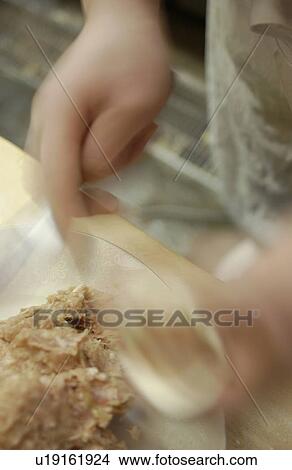 Picture - Chef making dim sum, blurred motion. Fotosearch