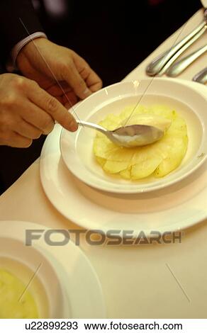 Chef putting ice cream on pineapple rings View Large Photo Image Stock Image - Chef putting ice cream on pineapple rings. Fotosearch