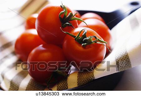 Cherry tomatoes View Large Photo Image Stock Image - Cherry tomatoes. Fotosearch
