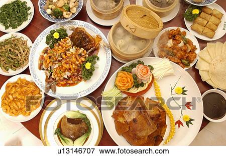 Chinese dishes on table, close up View Large Photo Image Stock Photo - Chinese dishes on table, close up. Fotosearch