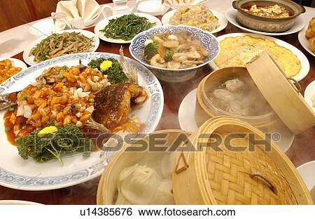 Chinese dishes on table, close up View Large Photo Image Stock Photograph - Chinese dishes on table, close up. Fotosearch