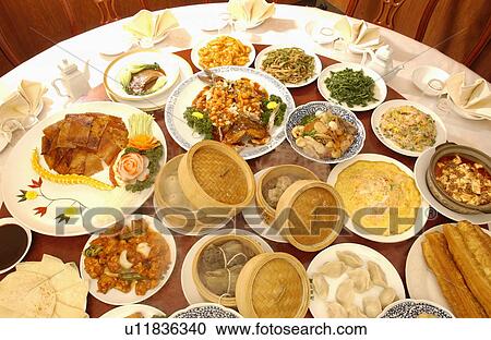 Stock Image - Chinese dishes on table. Fotosearch