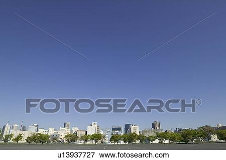 Cityscape under blue sky, copy space, Tokyo prefecture, Japan View Large Photo Image Stock Photo - Cityscape under blue sky, copy space, Tokyo prefecture, Japan. Fotosearch