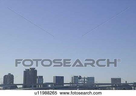 Stock Photography - Cityscape under blue sky, copy space, Tokyo prefecture, Japan. Fotosearch