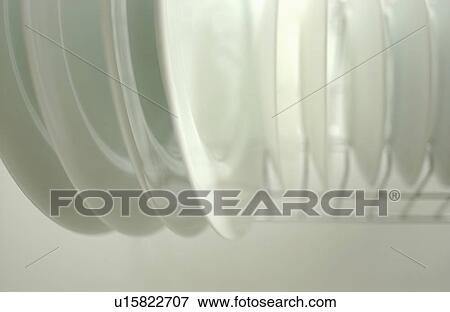 Clean plates on dish rack, close up, white background View Large Photo Image Stock Photo - Clean plates on dish rack, close up, white background. Fotosearch