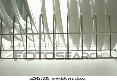 Clean plates on dish rack, close up, white background View Large Photo Image Stock Photography - Clean plates on dish rack, close up, white background. Fotosearch