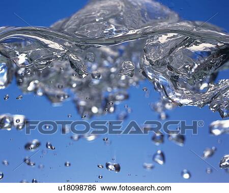 Stock Photograph - Close Up Image of Bubbles in Water. Fotosearch