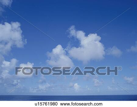 Stock Image - Clouds in blue sky. Fotosearch