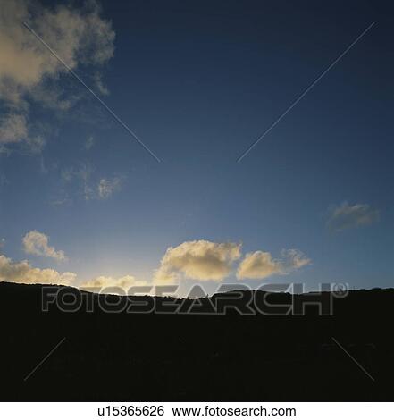 Clouds in blue sky View Large Photo Image Stock Photograph - Clouds in blue sky. Fotosearch