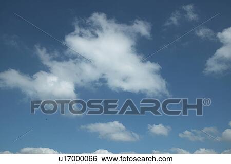 Clouds in blue sky View Large Photo Image Stock Photograph - Clouds in blue sky. Fotosearch