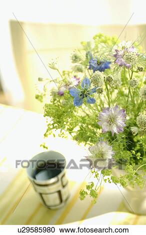 Stock Image - Coffee and flowers. Fotosearch