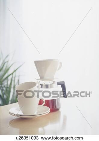 Coffee pot and cups on table View Large Photo Image Stock Image - Coffee pot and cups on table. Fotosearch