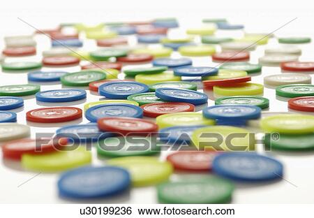 Stock Photograph - Colorful Plastic Coins. Fotosearch