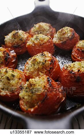 Cooked cherry tomatoes View Large Photo Image Stock Photo - Cooked cherry tomatoes. Fotosearch