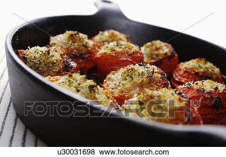 Cooked cherry tomatoes View Large Photo Image Stock Photo - Cooked cherry tomatoes. Fotosearch