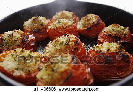 Cooked cherry tomatoes View Large Photo Image Stock Photograph - Cooked cherry tomatoes. Fotosearch