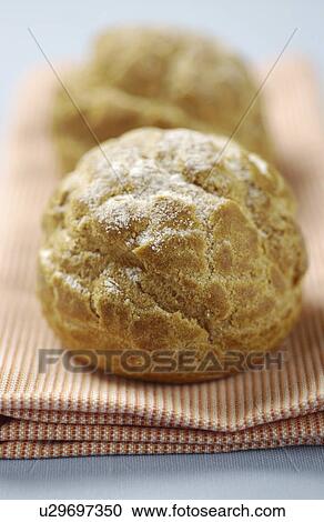 Cream puffs on a napkin View Large Photo Image Stock Image - Cream puffs on a napkin. Fotosearch