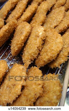 Croquettes on tray, close up View Large Photo Image Stock Photo - Croquettes on tray, close up. Fotosearch