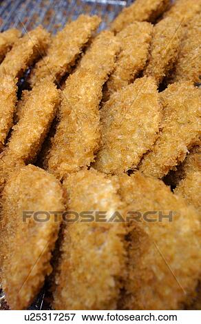 Croquettes on tray, close up View Large Photo Image Stock Photo - Croquettes on tray, close up. Fotosearch