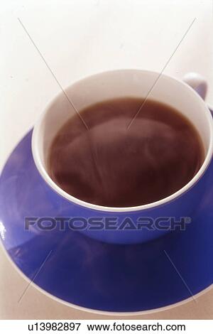 Cup of coffee, close up, white background View Large Photo Image Stock Photo - Cup of coffee, close up, white background. Fotosearch
