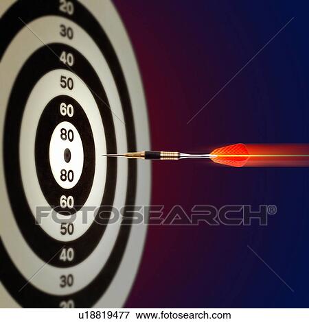 Dart reaching dartboard View Large Photo Image Stock Photo - Dart reaching dartboard. Fotosearch