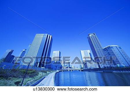 Dojima River and skyscrapers, Osaka Prefecture, Japan View Large Photo Image Stock Image - Dojima River and skyscrapers, Osaka Prefecture, Japan. Fotosearch