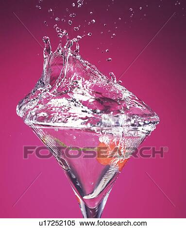 Drinks Spilling Over from the Cocktail Glass View Large Photo Image Stock Photography - Drinks Spilling Over from the Cocktail Glass. Fotosearch