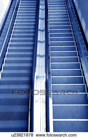 Escalator, toned image, blurred motion View Large Photo Image Stock Photo - Escalator, toned image, blurred motion. Fotosearch