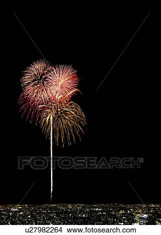 Picture - Fireworks over city skyline, Tokyo Prefecture, Honshu, Japan. Fotosearch