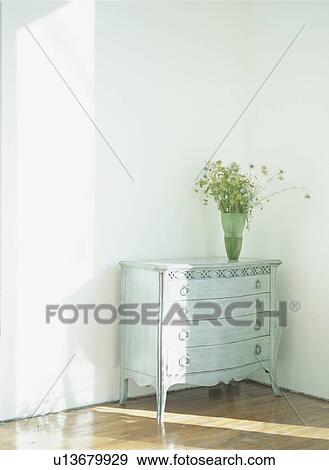 Flowers on chest View Large Photo Image Stock Photo - Flowers on chest. Fotosearch