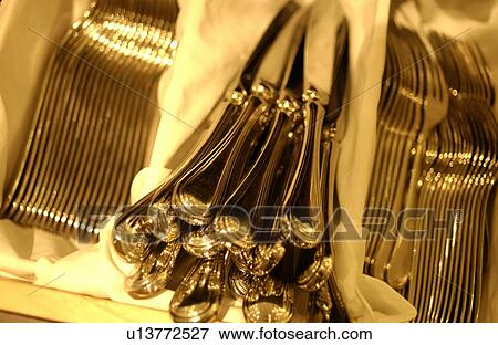Forks and table knives in box, close up View Large Photo Image Stock Photo - Forks and table knives in box, close up. Fotosearch