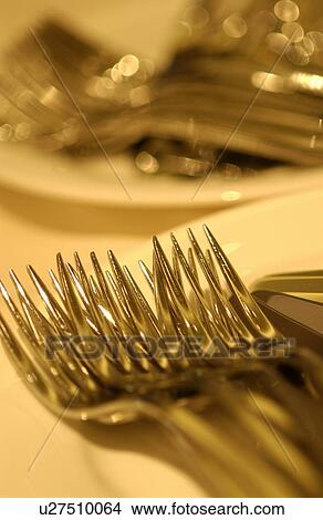 Picture - Forks on plate. Fotosearch