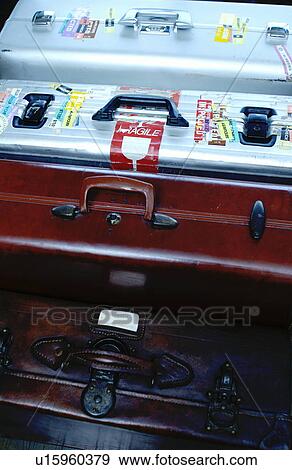 Four suitcases, close up View Large Photo Image Stock Photo - Four suitcases, close up. Fotosearch
